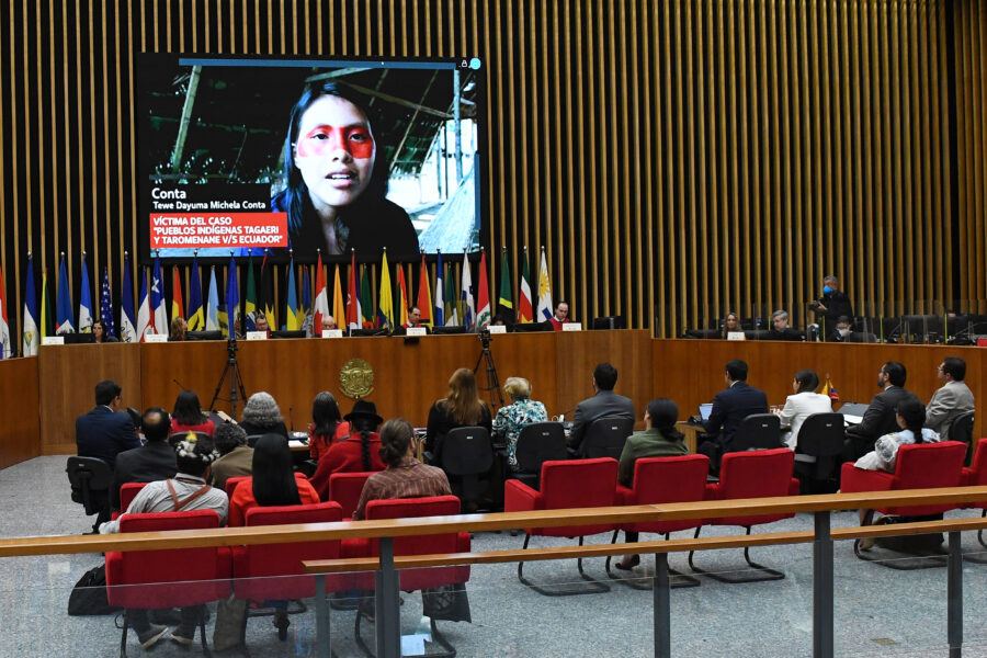 Conta, a member of the Tagaeri and Baihuaeri Waorani Indigenous groups, appears (via pre recorded video) before the Inter-American Court of Human Rights on August 23, 2022 for a hearing in the first ever court case involving the rights of uncontacted Indigenous peoples. Conta lived the first six or seven years of her life in voluntary isolation with her Tageri family. Credit: Courtesy of the Inter American Court of Human Rights