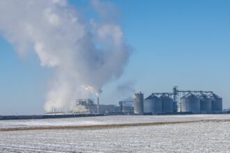 The Poet bioprocessing plant in Jewell, Iowa, which produces 90 million gallons of ethanol annually. Several pipelines have been proposed in the Midwest that would deliver millions of metric tons of carbon dioxide captured every year from Midwest ethanol plants to underground storage facilities. Credit: Michael Siluk/UCG/Universal Images Group via Getty Images