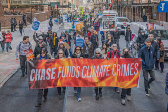 Seniors in New York City and a coalition of environmental groups held a rally on March 21, 2023 as part of a National Day of Action to pressure the major banks to stop financing the expansion of the fossil fuel industry. Credit: Erik McGregor/LightRocket via Getty Images