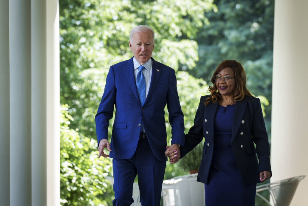 Catherine Coleman Flowers and President Joe Biden arrive for an event in the Rose Garden of the White House on April 21, 2023. Credit: Drew Angerer/Getty Images