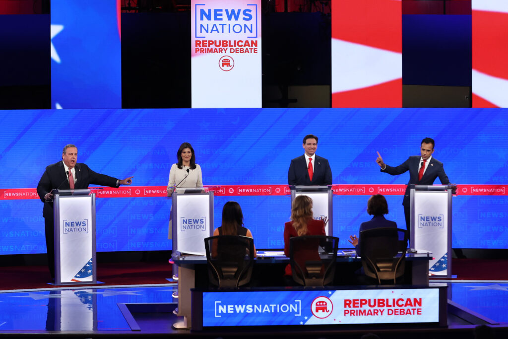 The Republican presidential hopefuls (L-R) former New Jersey Gov. Chris Christie, former U.N. Ambassador Nikki Haley, Florida Gov. Ron DeSantis and Vivek Ramaswamy squared off during the fourth Republican primary debate without current frontrunner and former U.S. President Donald Trump, who has declined to participate in any of the previous debates. Credit: Justin Sullivan/Getty Images