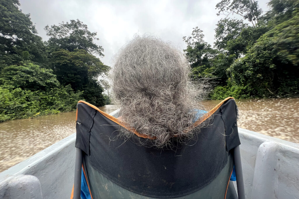 Judith Kimerling travels up the Shiripuno river just outside Ecuador's Intangible Zone on March 12, 2023. Credit: Katie Surma/Inside Climate News