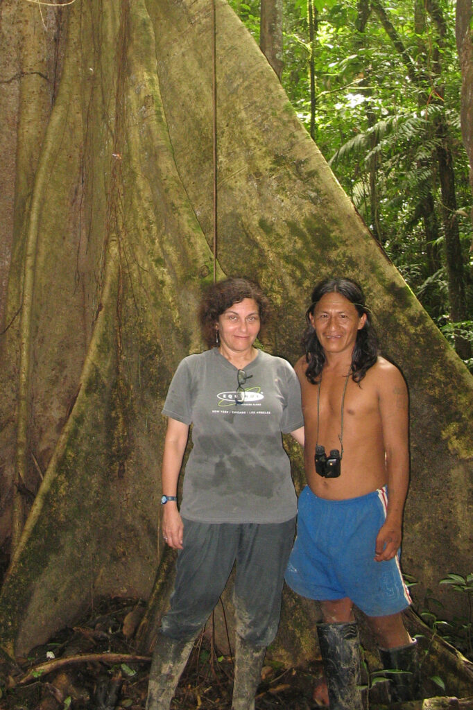 Judith Kimerling and Penti Baihua, a traditional Baihuaeri leader, stand before a ceibo tree in the Intangible Zone in Ecuador on December 27, 2007. Credit: Courtesy of Judith Kimerling
