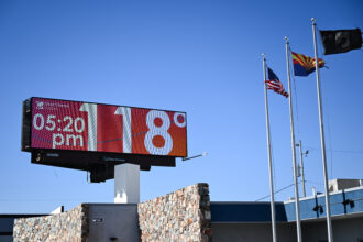 A billboard displays a temperature of 118 degrees Fahrenheit during a record heat wave in Phoenix, Arizona on July 18, 2023. Swaths of the United States home to more than 80 million people were under heat warnings or advisories, as relentless, record-breaking temperatures continued to bake western and southern states. Credit: Patrick T. Fallon/AFP via Getty Images.