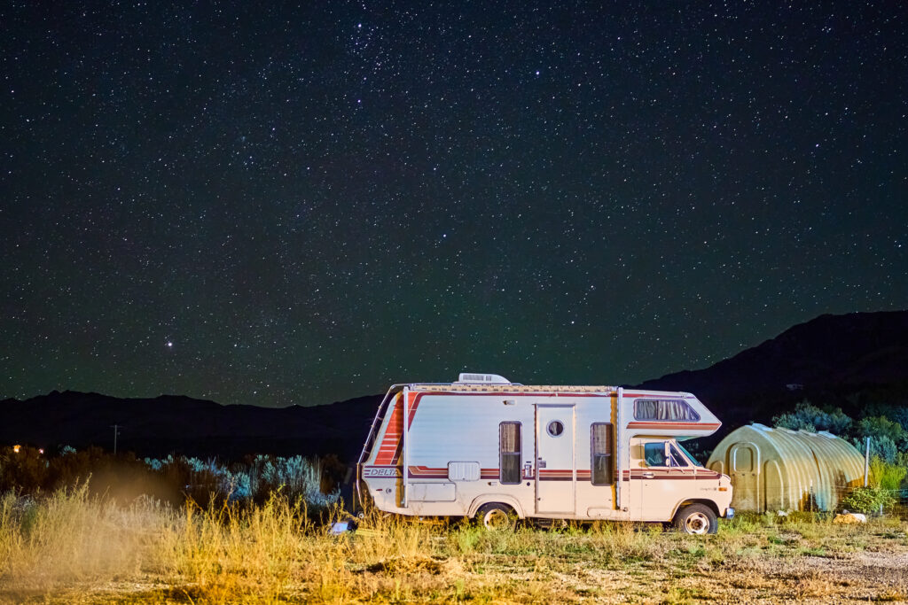 The stars are seen over an RV camper on Rick and Delaine Spilsbury’s property, tin Ely, Nevada, on Thursday Oct. 5, 2023. The area around the Spilsbury’s house is a dark sky community. Credit: Alex Gould