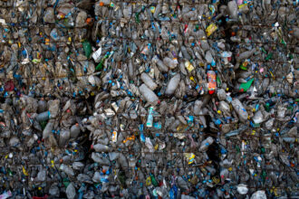 Cubes of sorted compressed plastic bottles are seen at the recycling center at the Sile Integrated Waste Facility Center on March 12, 2018 in Istanbul, Turkey. Credit: Chris McGrath/Getty Images