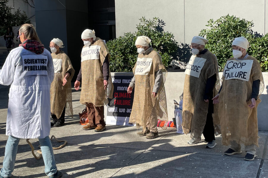 Scientist Rebellion, Extinction Rebellion and other scientist-activist groups staged a play dramatizing the threats fossil fuel development pose to the planet at the American Geophysical Union annual meeting in San Francisco. Credit: Liza Gross/Inside Climate News