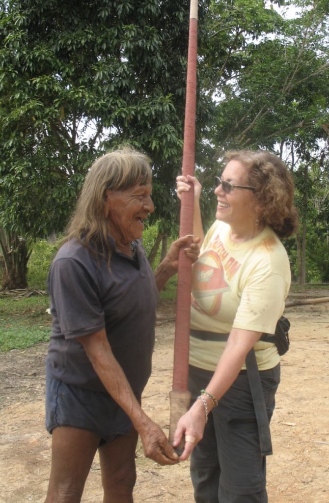 Kemperi gifting Judith Kimerling a traditional Waorani blowgun he made for her. Jan. 2016. Credit: Courtesy of Judith Kimerling